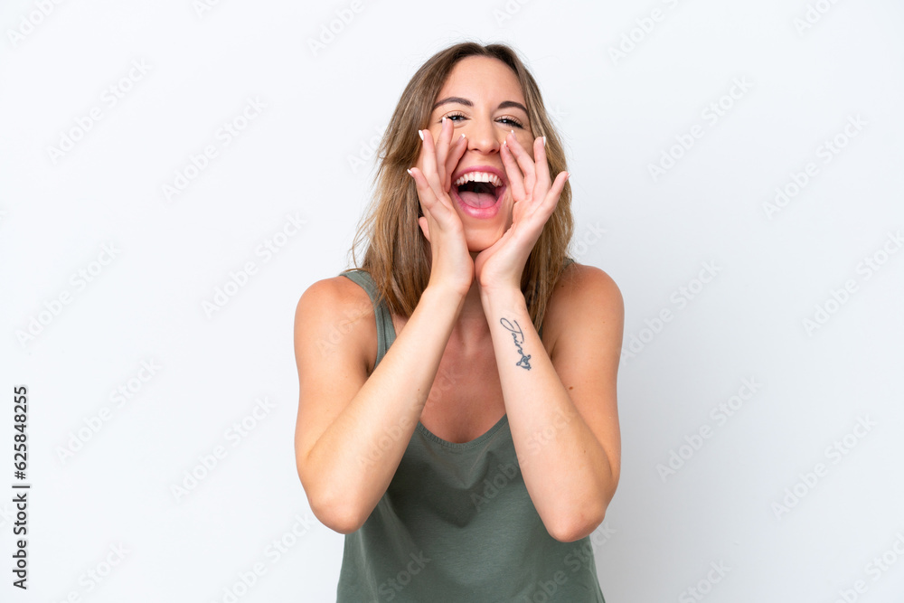 Young caucasian woman isolated on white background shouting and announcing something Young caucasian woman isolated on white background shouting and announcing something