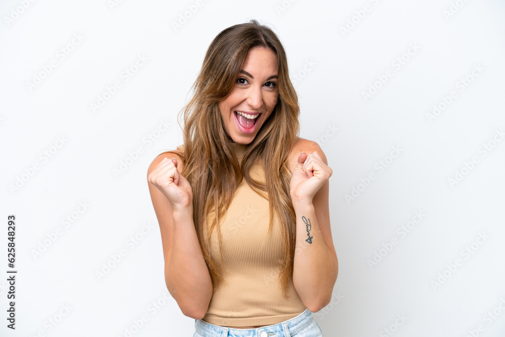 Young caucasian woman isolated on white background celebrating a victory in winner position Young caucasian woman isolated on white background celebrating a victory in winner position