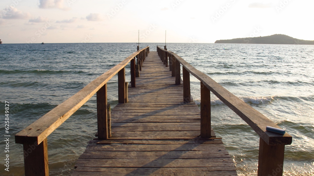Wooden dock into the water