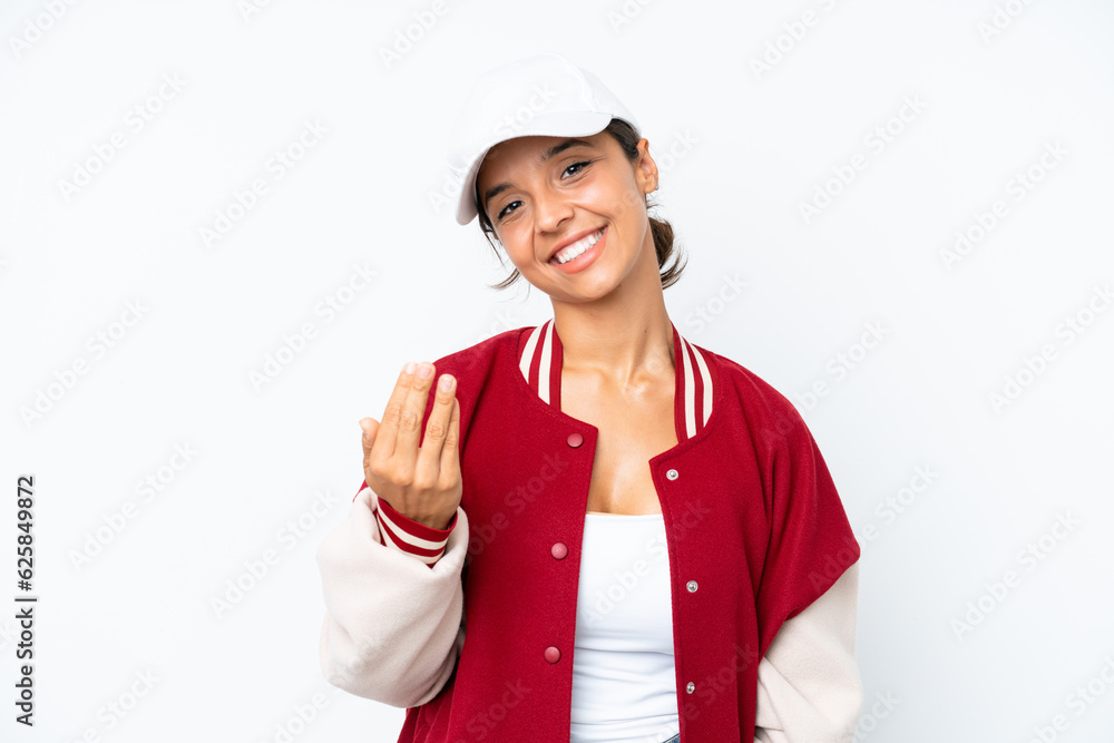 Young hispanic woman wearing a baseball uniform isolated on white background inviting to come with hand. Happy that you came Young hispanic woman wearing a baseball uniform isolated on white background inviting to come with hand. Happy that you came