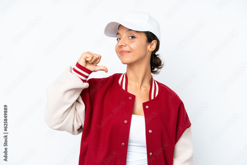 Young hispanic woman wearing a baseball uniform isolated on white background proud and self-satisfied Young hispanic woman wearing a baseball uniform isolated on white background proud and self-satisfied