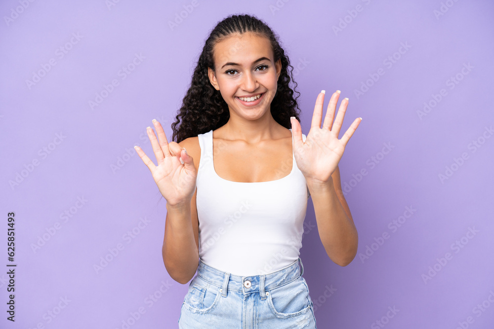 Young woman isolated on purple background counting eight with fingers