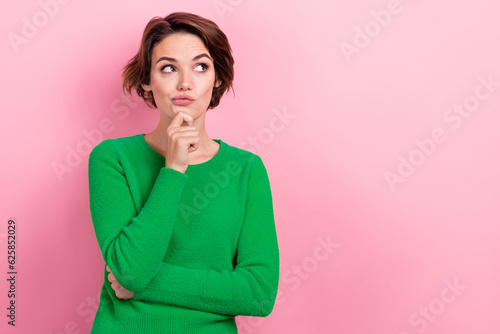 Cuadro en lienzo Portrait of thoughtful young girl hair wear green jumper touch chin ponder look