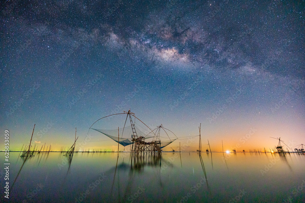 Milky way and fishing net  at Pakpra, Thale Noi ,Thailand