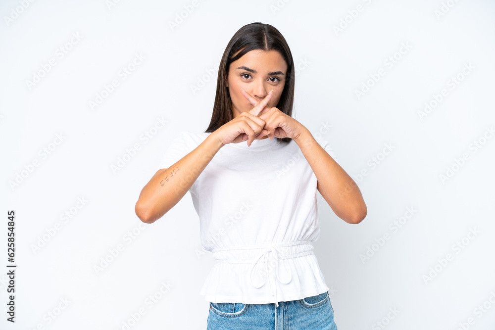 Young caucasian woman isolated on white background showing a sign of silence gesture Young caucasian woman isolated on white background showing a sign of silence gesture