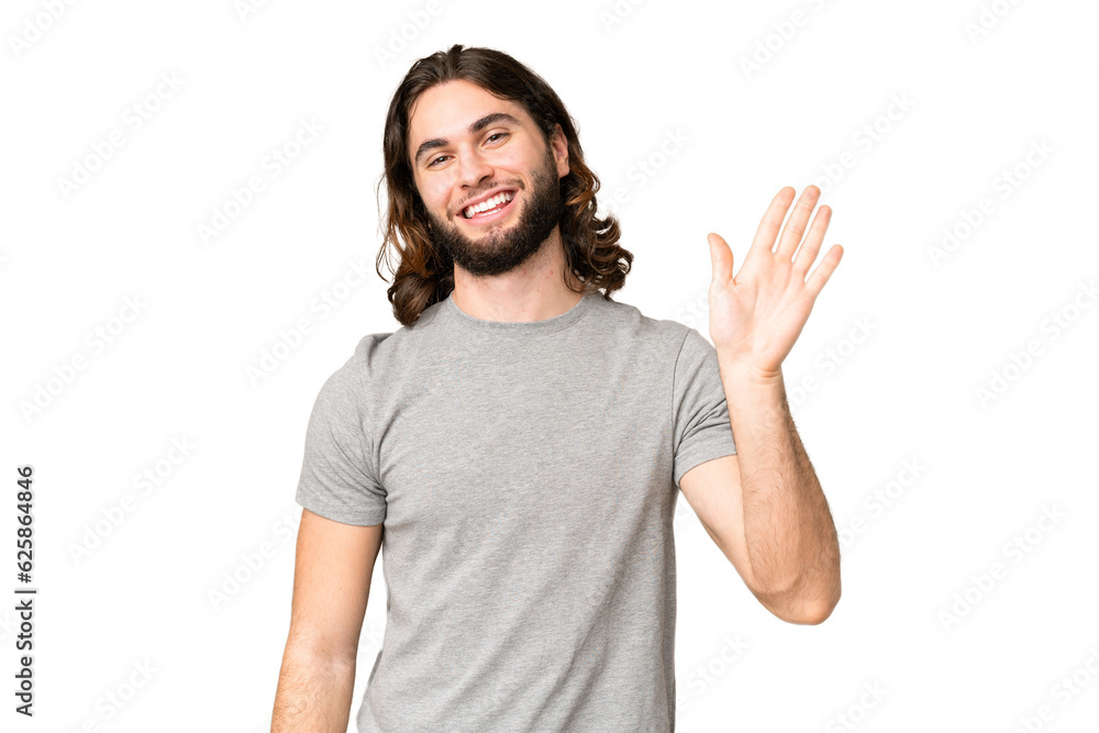 Young handsome man over isolated chroma key background saluting with hand with happy expression Young handsome man over isolated chroma key background saluting with hand with happy expression