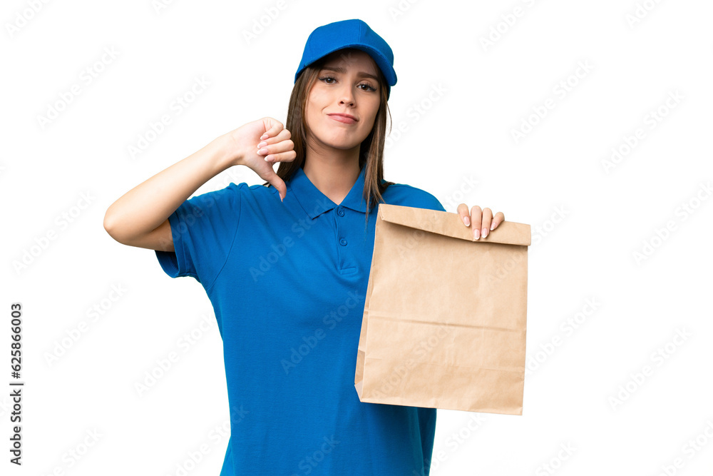 Young beautiful caucasian woman taking a bag of takeaway food over isolated background showing thumb down with negative expression Young beautiful caucasian woman taking a bag of takeaway food over isolated background showing thumb down with negative expression