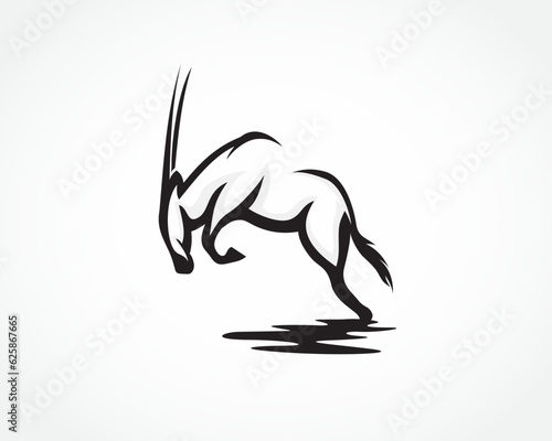 Fototapeta Naklejka Na Ścianę i Meble -  jump rampage silhouette oryx logo design template illustration inspiration