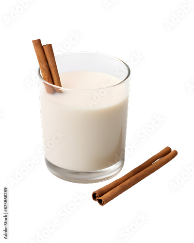 cinnamon sticks and glass of milk