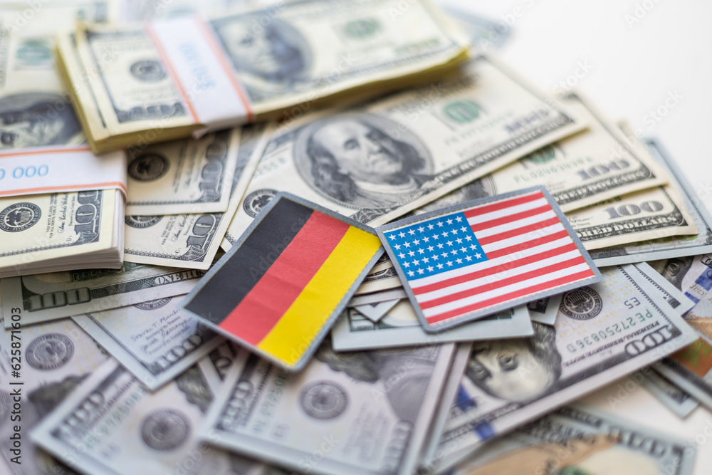 Us dollar banknote with a german and usa flag Us dollar banknote with a german and usa flag