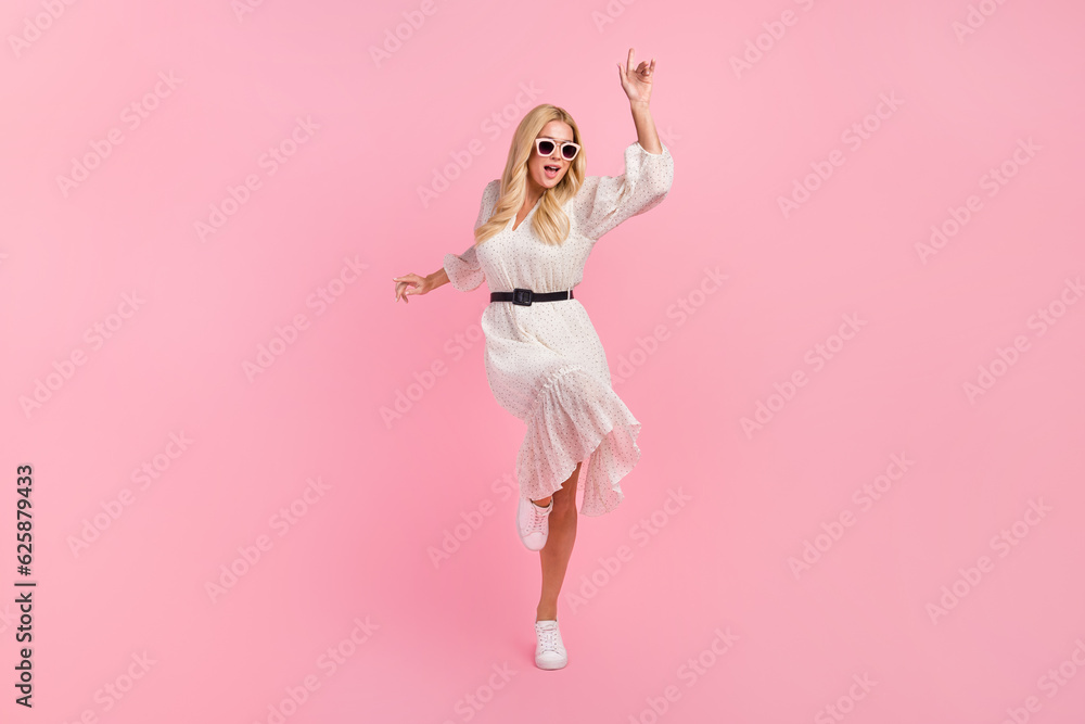 Full body length care of carefree nice woman dance good mood vibe shopping clothes promo trendy dress isolated on pink color background Full body length care of carefree nice woman dance good mood vibe shopping clothes promo trendy dress isolated on pink color background