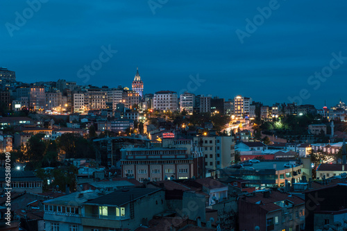 The Galata Tower on the Istanbul skyline at night, Turkey. City panorama at night