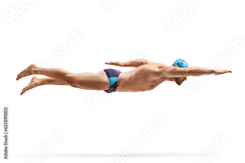 Obraz na plátne Male swimmer with a cap and goggles swimming freestyle stroke
