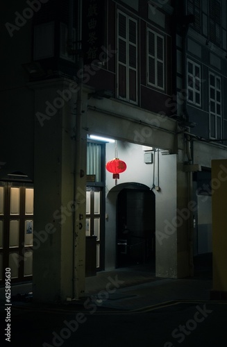 lunar new year lantern in front of shophouse