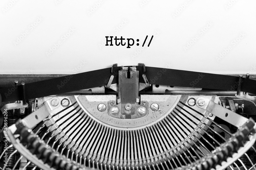 HTTP web word closeup being typing and centered on a sheet of paper on old vintage typewriter mechanical - obrazy, fototapety, plakaty 