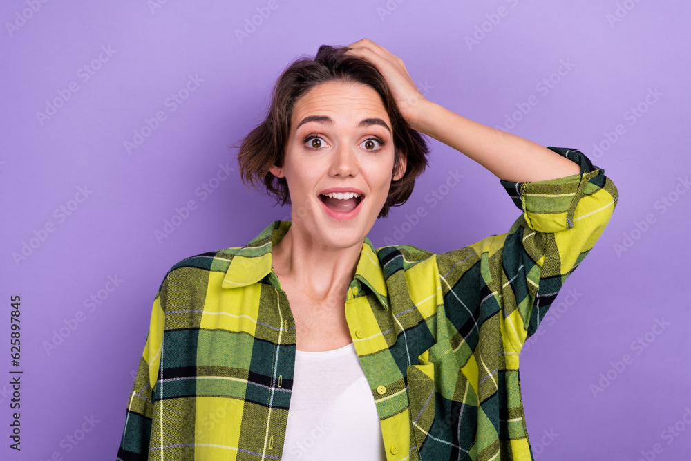 Photo of impressed reaction funny young lady hand head staring unexpected breaking news forget oops isolated on violet color background Photo of impressed reaction funny young lady hand head staring unexpected breaking news forget oops isolated on violet color background