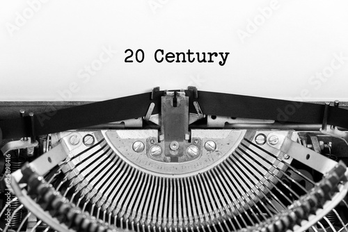 20 century word closeup being typing and centered on a sheet of paper on old vintage typewriter mechanical