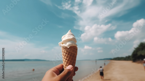 Iceacream in the hand of a man in front of the beach at the blue ocean. Generative AI.