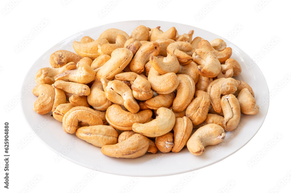 Roasted brown cashew nuts in stack on white plate isolated on white background with clipping path in png file format Roasted brown cashew nuts in stack on white plate isolated on white background with clipping path in png file format