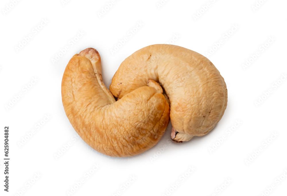 Top view of two Roasted brown cashew nuts in stack isolated on white background with clipping path. Close up photo