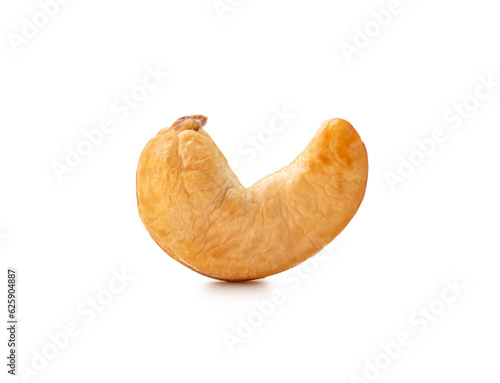 Close up of single roasted peeled cashew nut isolated on white background with clipping path.