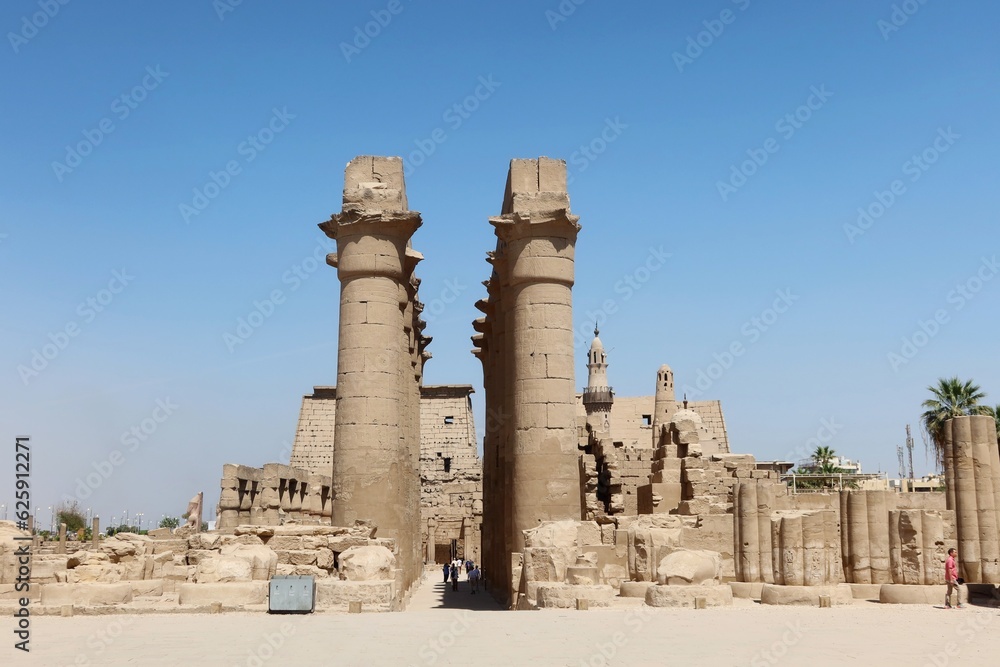 The great stone columns and statues in Luxor temple in the East bank in Egypt The great stone columns and statues in Luxor temple in the East bank in Egypt