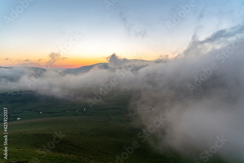 aerial view of persembe yaylasi huge fog on sky on plateau