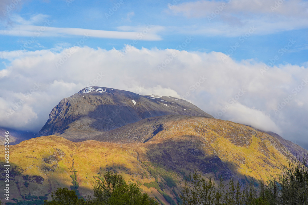 Fototapeta premium Ben Nevis mountain top seen from Corpach in Scotland. It is the highest mountain in the UK