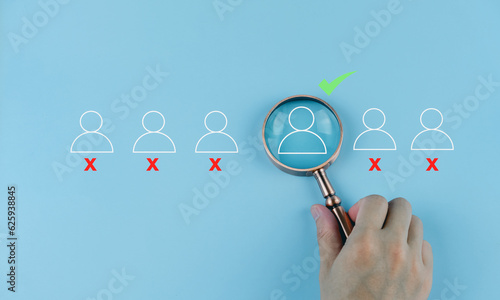Businessman magnifying glass showing human resources virtual icon or HRM, focus manager icon, one of employee icons for leadership service, leading organization in recruiting and prospecting