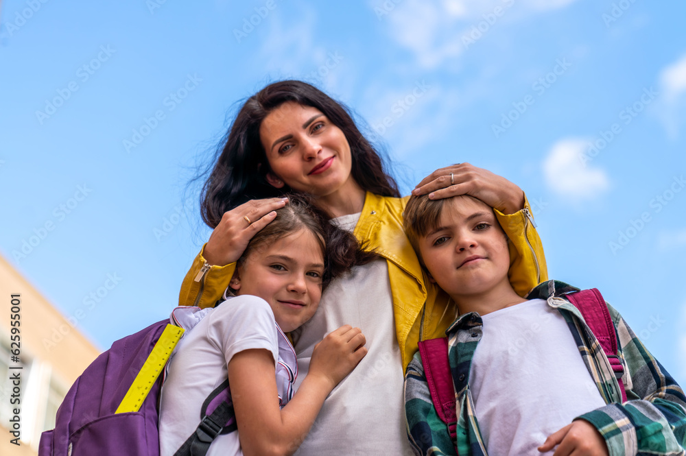Portrait of a mother and her children on the street Portrait of a mother and her children on the street