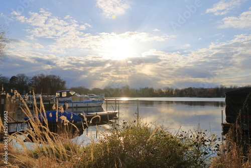 the Havel river and Caputh embankment in the early spring photo