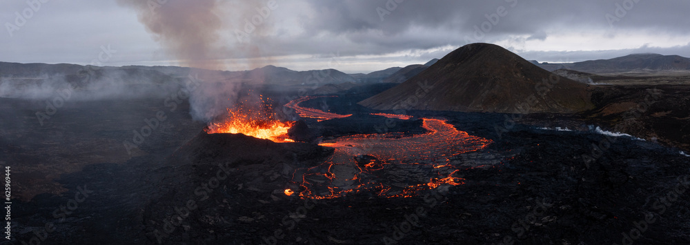 Aerial Panoramic view of Volcano Eruption, Litli-Hrútur Hill, Fagradalsfjall Volcano System in Iceland. Reykjanes Peninsula. High Resolution Ultra Wide Image. Aerial Panoramic view of Volcano Eruption, Litli-Hrútur Hill, Fagradalsfjall Volcano System in Iceland. Reykjanes Peninsula. High Resolution Ultra Wide Image.
