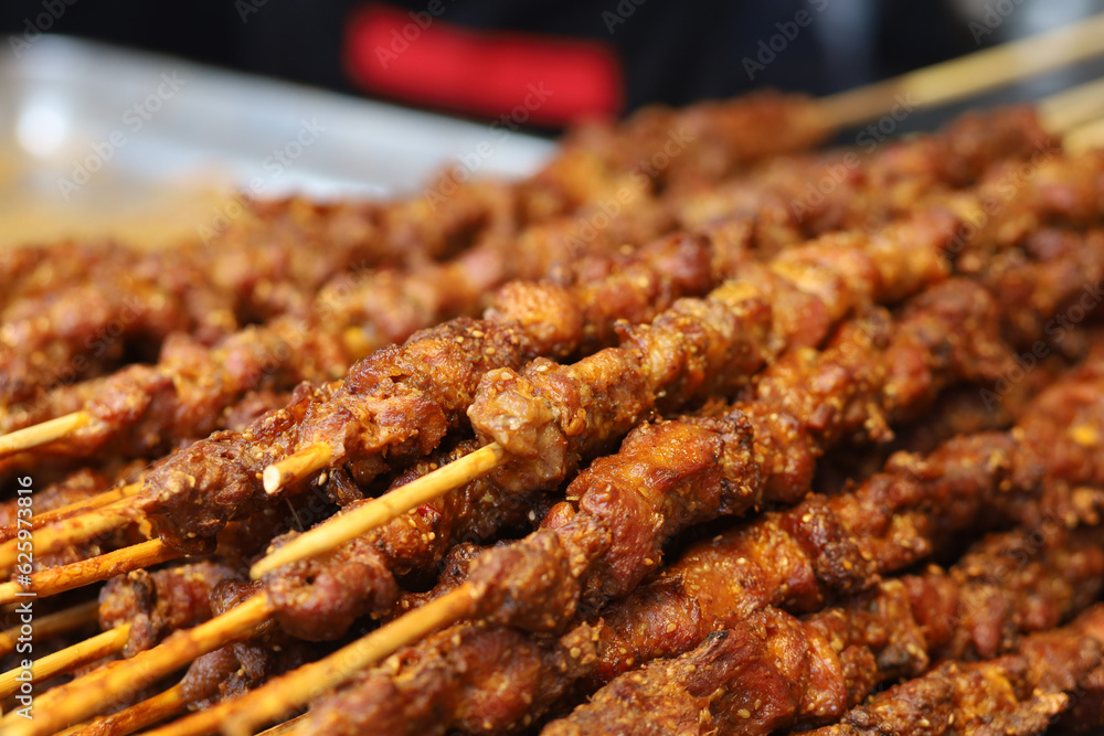 close-up of delicious grilled meat skewers