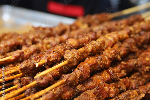 close-up of delicious grilled meat skewers