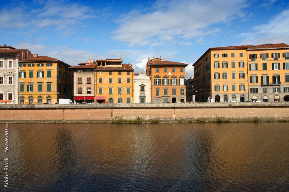 Pisa Italian town. Old Town in Tuscany. Arno river view.