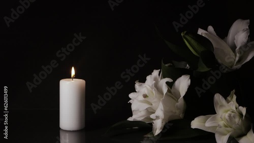 Candle and Lily on black background