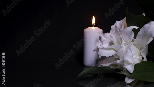 Candle and Lily on black background