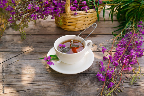 Healthy organic leaves Ivan chai tea Russian herbal on the wooden table photo