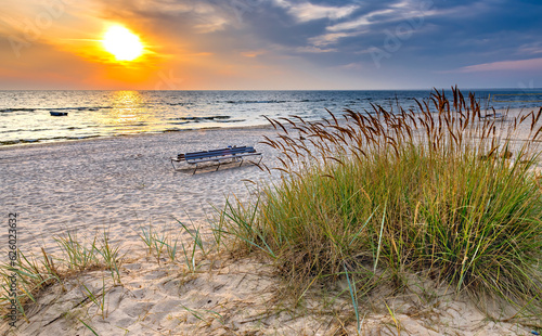 Sunrise above the water horizon in Jurmala - famous Baltic tourist  resort in...