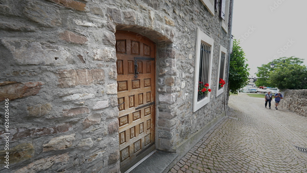MONTREUX SWITZERLAND MARCH 1 2022 Traditional old European front home antique wooden door in street