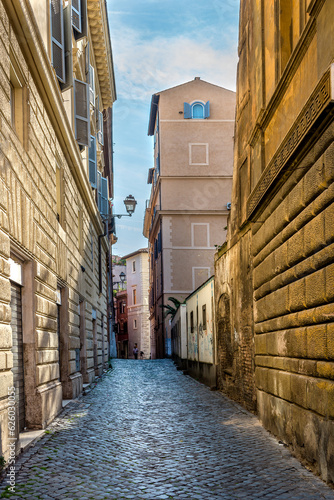 Narrow italian street in the morning