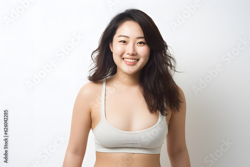 asian chubby fitness model wearing tank top smile