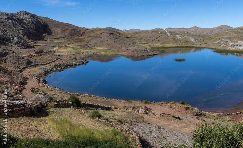 Small lake in the remote Bolivian Andes between Torotoro and Oruro - Traveling and exploring wild places in South America