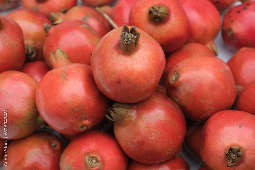 Group of pomegranates. Pomegranate closeup, Group of pomegranates. Pomegranate closeup,