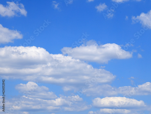 Beautyful blue sky with white clouds. Blue sky with clouds background. Calm bright day in summer.