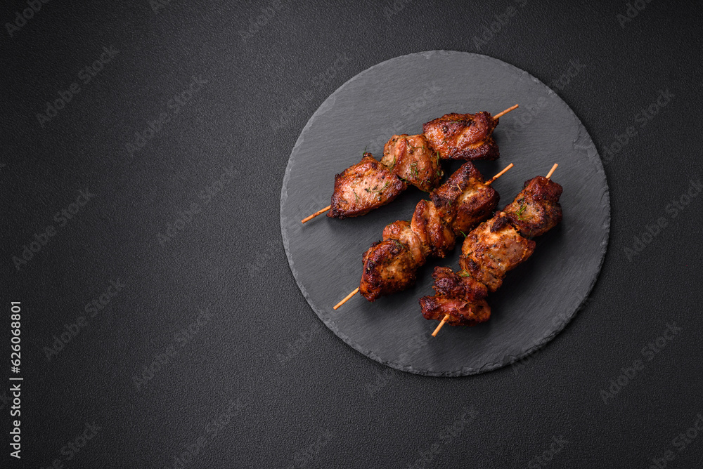 Delicious grilled chicken, turkey or pork skewers with salt, spices and herbs