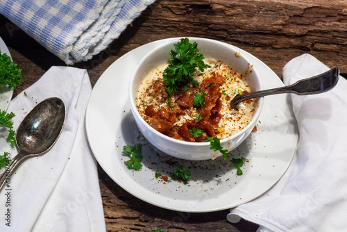 Crab and corn bisque or chowder in blue and white crockery.