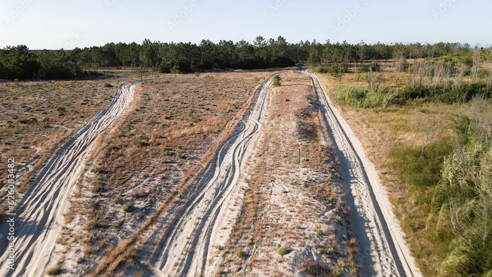 Aerial drone shot view of one enduro motorcycle drive Aerial drone shot view of one enduro motorcycle drive