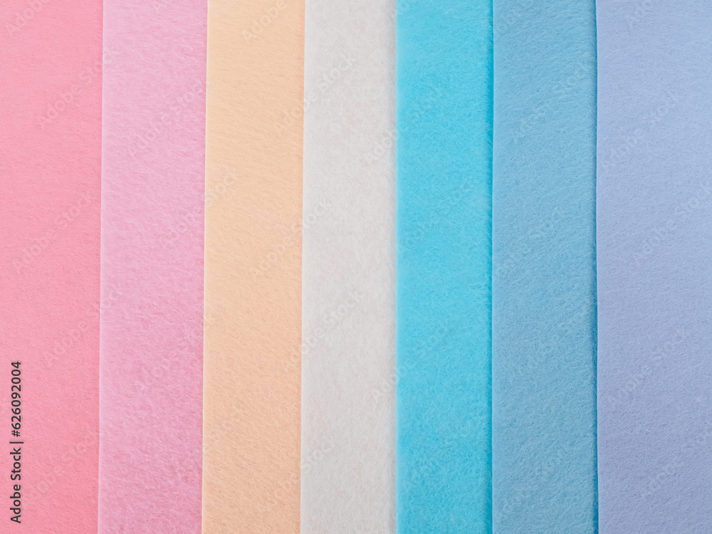 Fototapeta premium Pastel background, A stack of colorful fabric.Full frame shot of muti colored fabric background