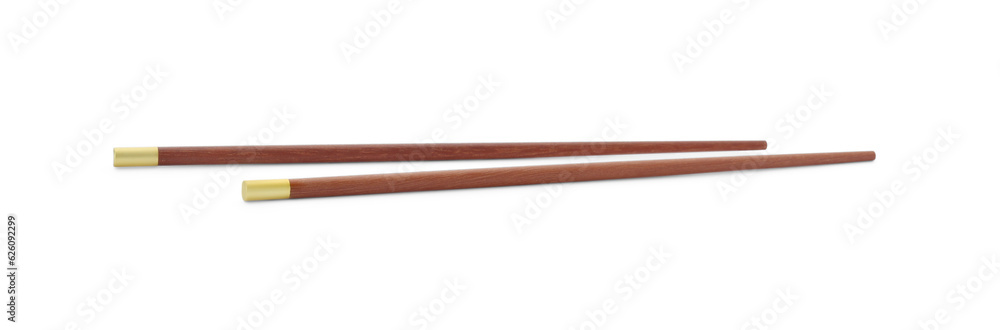 Pair of wooden chopsticks isolated on white Pair of wooden chopsticks isolated on white